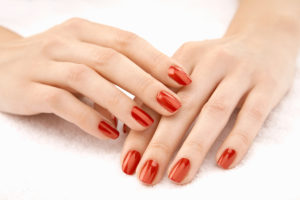 Close-up of woman's manicured hands