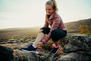 Woman who injured her ankle while hiking on rocks